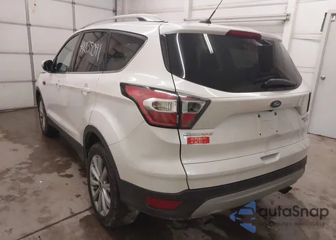 2017 Ford Escape Titanium z USA, uszkodzony, nr VIN 1FMCU9JD2HUB56161